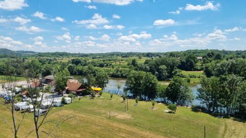 an aerial view of a park next to a river at Sun river Kolpa AP1 in Vinica