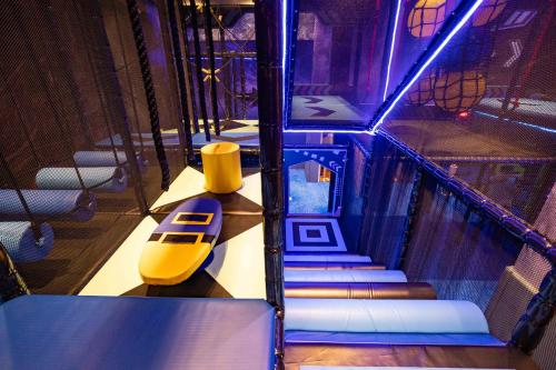 a set of stairs in a room with a train at Hualien Farglory Hotel in Yanliau