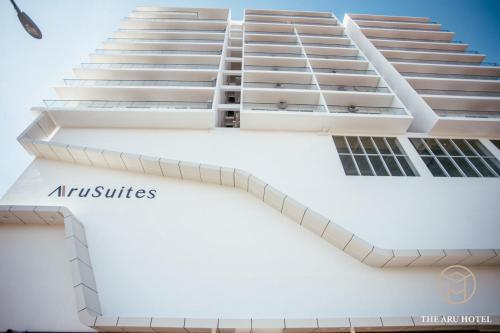 a rendering of the entrance to an apartment building at The Aru Hotel at Aru Suites in Kota Kinabalu