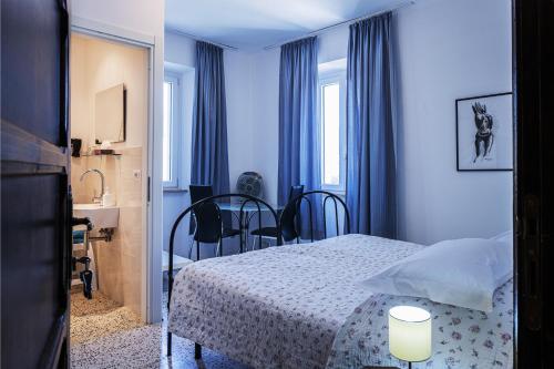 Ένα ή περισσότερα κρεβάτια σε δωμάτιο στο Casa Friano
