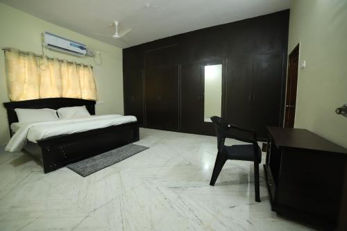 Katil atau katil-katil dalam bilik di Royal Home Stay deluxe Room