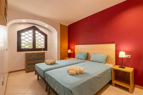 Кровать или кровати в номере GO2TENERIFE Apart'Chaga Terrace, Pools & Free Parking