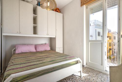 Katil atau katil-katil dalam bilik di Casa bastione con splendida vista