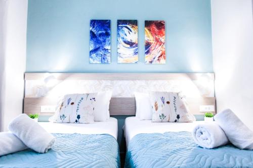 Postel nebo postele na pokoji v ubytování Sonio Villas - Que Bella Collection