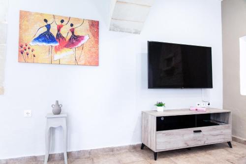 TV a/nebo společenská místnost v ubytování Sonio Villas - Que Bella Collection