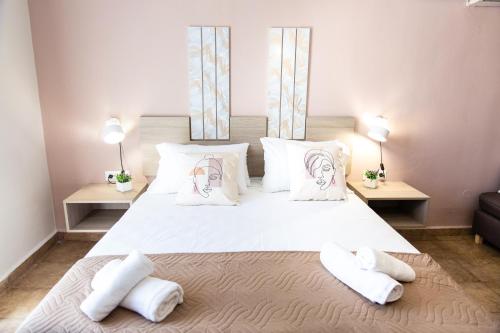 Postel nebo postele na pokoji v ubytování Sonio Villas - Que Bella Collection