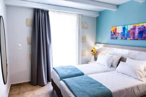 Postel nebo postele na pokoji v ubytování Sonio Villas - Que Bella Collection