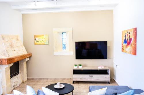 TV a/nebo společenská místnost v ubytování Sonio Villas - Que Bella Collection
