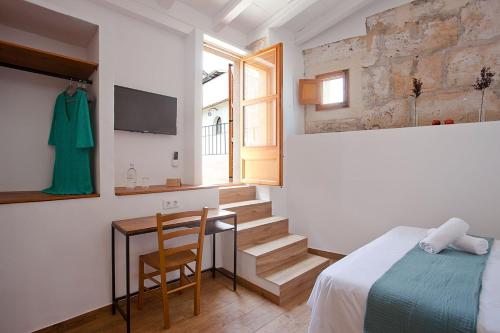 Ένα ή περισσότερα κρεβάτια σε δωμάτιο στο My Rooms Artà Adults Only by My Rooms Hotels TI