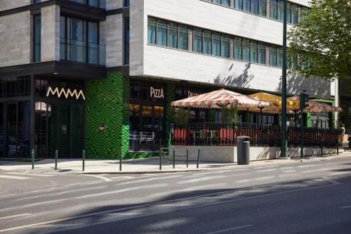 a restaurant on the side of a building at Mama Shelter Lisboa in Lisbon