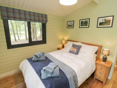 Lake View Lodge tesisinde bir odada yatak veya yataklar