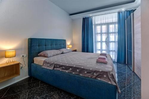 Voodi või voodid majutusasutuse Luxury Apartment Plavi Biser toas