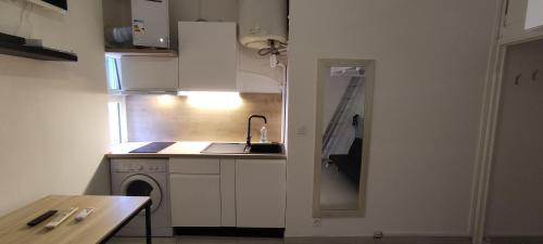 Køkken eller tekøkken på Nice Apartment S4