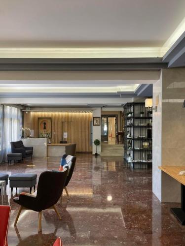 Coin salon dans l'établissement Bacoli Hotel