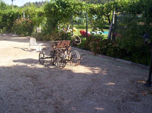 a bike parked on the side of a road at Stone Farm Hostel in Felgueiras