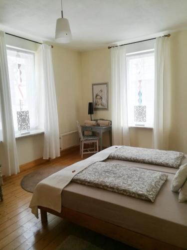 Katil atau katil-katil dalam bilik di Ferienwohnung Munich