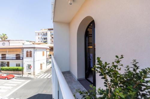 a door on the side of a building at Solmaris Tropea Rooms & Suites in Tropea