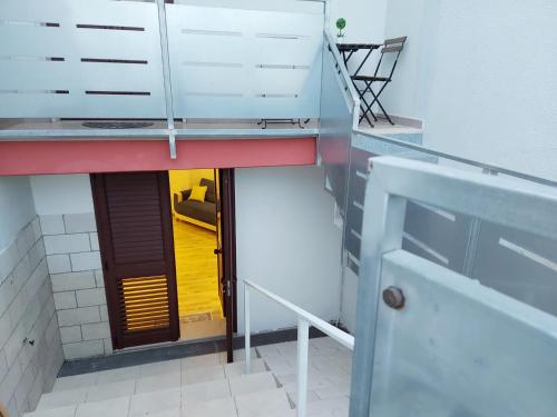 Palanda nebo palandy na pokoji v ubytování B&B Acchiappasogni