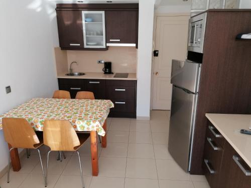 Una cocina o zona de cocina en Apartamentos Dalia