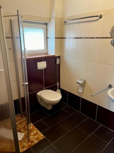 Bilik mandi di Gästehaus 2 Norden