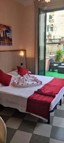 Hotel Galata tesisinde bir odada yatak veya yataklar