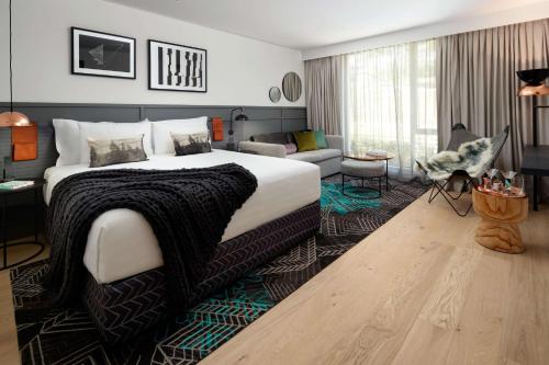 Cama o camas de una habitación en QT Queenstown