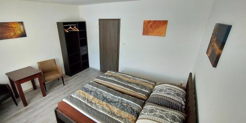 Cama o camas de una habitación en Penzion Šiškovna