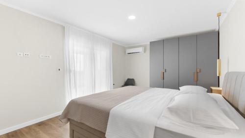 Posteľ alebo postele v izbe v ubytovaní Casa Adua