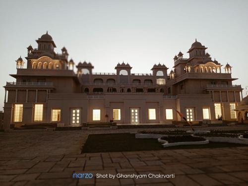 a large building with its lights on at The Utopia Resort Sanchi in Sānchi