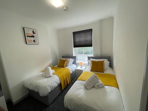 Ein Bett oder Betten in einem Zimmer der Unterkunft ED Executive Ipswich Accommodation