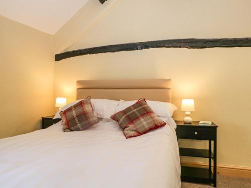 Llit o llits en una habitació de Fellside Cottage