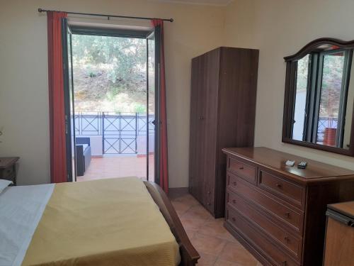 Ένα ή περισσότερα κρεβάτια σε δωμάτιο στο B&B Il Giardino di Zefiro