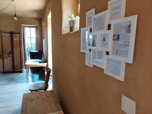 a room with a wall with papers on it at B&B Clogher Farm in Poperinge