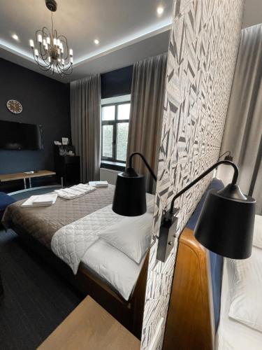 Una cama o camas en una habitación de Levanevsky Hotel