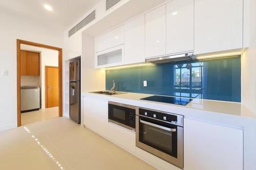 Η κουζίνα ή μικρή κουζίνα στο Biêt thự trong Wyndham Garden Cam Ranh