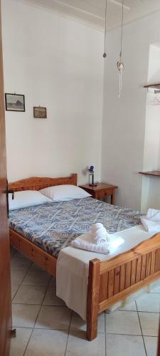 Voodi või voodid majutusasutuse Maroudas Traditional Guest House toas