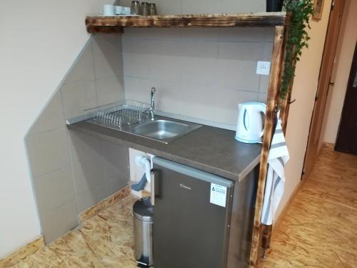 Kuchyň nebo kuchyňský kout v ubytování Garni