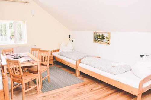 Postel nebo postele na pokoji v ubytování Pension s'Platzl Stuhleck
