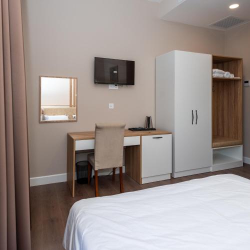 Kuchyň nebo kuchyňský kout v ubytování OLF Hotel