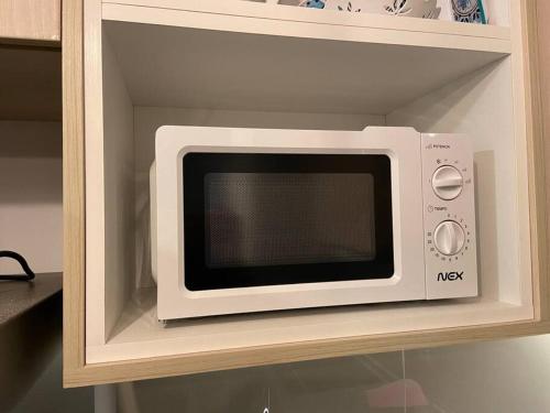 Кухня или мини-кухня в Maravilloso Departamento Nuevo, en edificio ECO COSTAS de Concon frente a Dunas y al JUMBO en Bosques De Montemar con Estacionamiento gratuito techado-check in 24-7 cable y wifi
