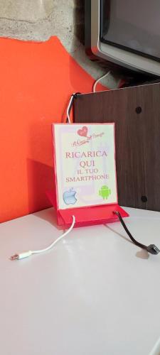 a sign on a table that says merwegian cut enchantment at Al Cuore del Borgo in Castelmezzano