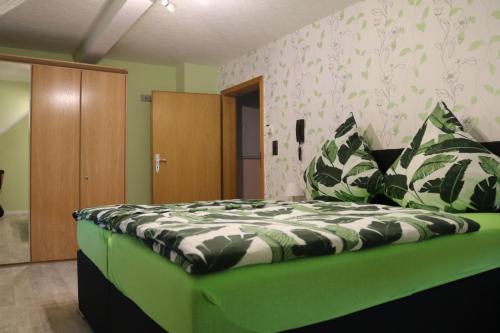 En eller flere senge i et værelse på Gästehaus Rheinburgenblick