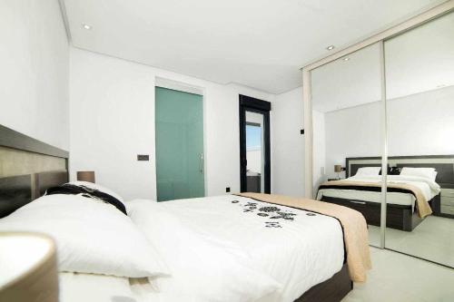 Postel nebo postele na pokoji v ubytování Espanhouse Diamante apartment
