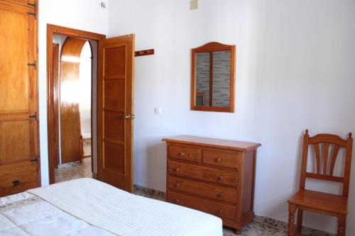 מיטה או מיטות בחדר ב-Casa La Maceta