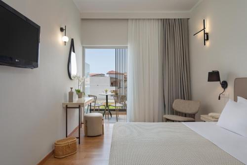Postel nebo postele na pokoji v ubytování Preveza City Comfort Hotel