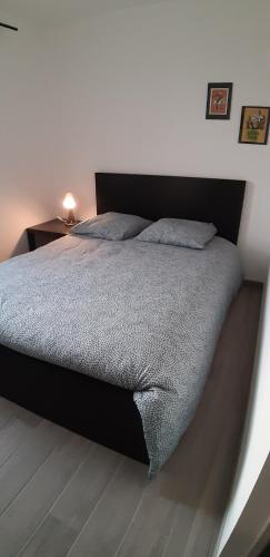 Posteľ alebo postele v izbe v ubytovaní Le 66 bis - maison neuve