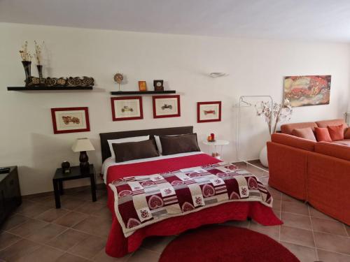 Postel nebo postele na pokoji v ubytování Artemide B&B