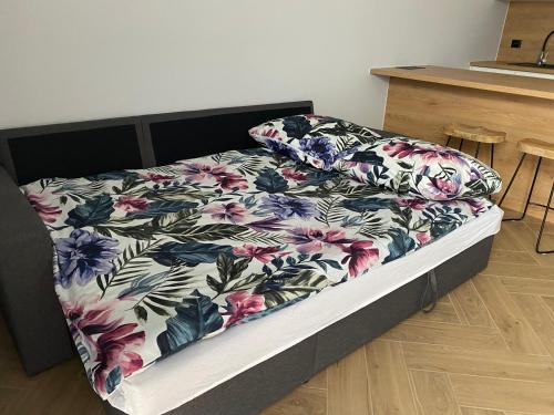 Posteľ alebo postele v izbe v ubytovaní Apartament Aleja Centrum Białystok