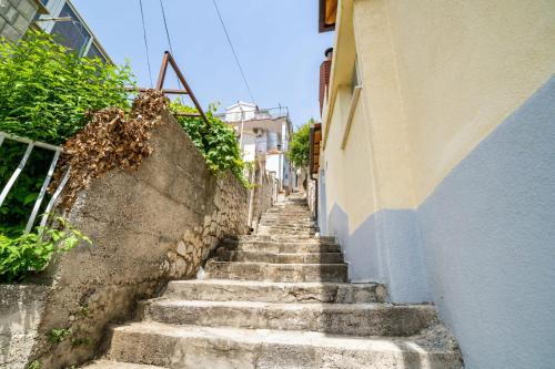 a set of stairs leading up to a building at Dubrovnik dream by Nostromo in Dubrovnik