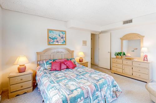a bedroom with a bed and two night stands at Wight Street - Unit 2 in Ocean City